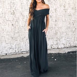 Vici pocketed off shoulder maxi dress